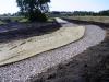 grassed waterway with stone protection